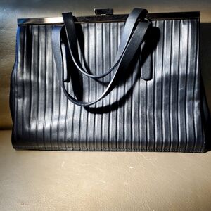 LIA NUMA gorgeous new hand bag soft black leather with blue suede interior.